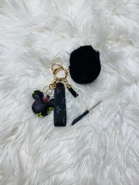 Black Faux Fur Pom Pom Keychain with Black Leather-Look Strap and Charm